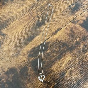 Silver heart necklace.